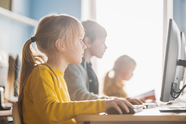 School kids learning about computer safety